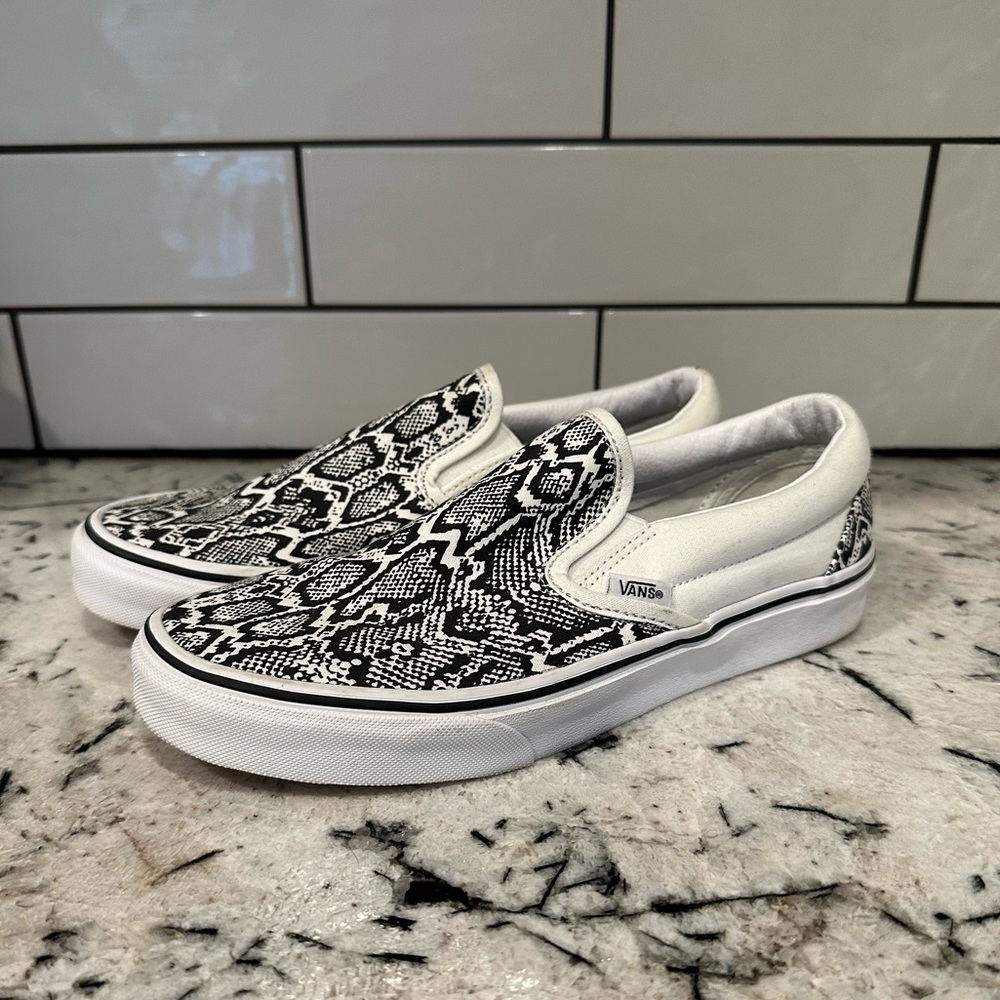 White & black snake print vans